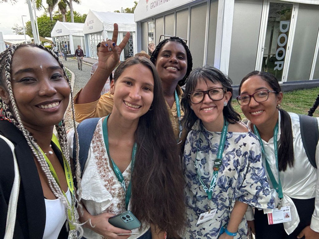 Photo of María José Mejía alongside Yurshell Rodriguez from If Not Us Then Who ? and some colleagues